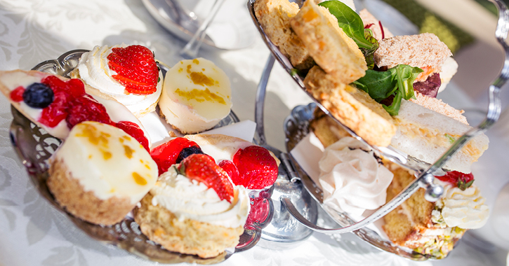 close up shot of scones, cakes and sandwiches part of an Afternoon Tea